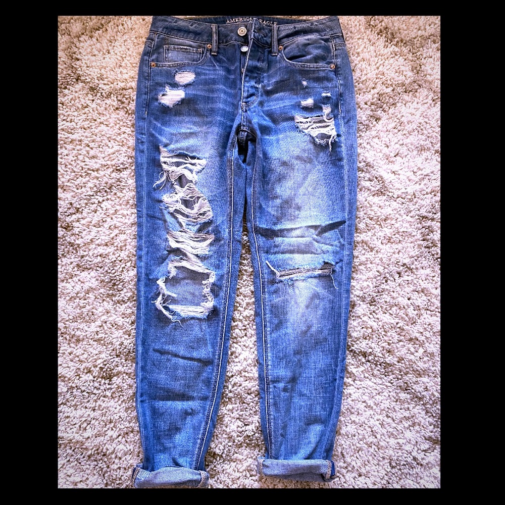 Vintage destroyed denim jeans